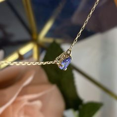 Vivid and colorful, this solitaire necklace features a purplish blue natural tanzanite, handcrafted in 14K solid gold. Made to Order. Ships within 3-4 weeks. - Stone info: 5mm almond heart shape natural tanzanite - Ct weight: approx. 0.5ct - Length: 16+2" adjustable - Made in 14 karat gold - Stamp with 14K. Solitaire Necklace, Solitaire Necklaces, Natural Tanzanite, Jewelry Gemstone, Heart Shape, Gemstone Jewelry, Solid Gold