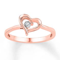 A single diamond accent embraced within a heart is the sparkling focal point in this affectionate ring for her. The ring is crafted in 10K rose gold. Jared Jewelry, Promise Ring Diamond, Rose Gold Promise Ring, Heart Promise Rings, Jewelry Advice, Geode Earrings, Diamond Heart Ring, Retro Ring, Diamond Promise Rings