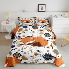 a bed with an orange fox on it