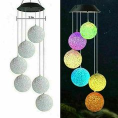 a wind chime with different colored balls hanging from it's sides and an image of