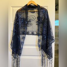 Gorgeous Sequined Shawl Wrap In Navy Blue, Brand New In The Bag. Bought For A Wedding And I Chose Another Option. Sheer Navy Mesh Fabric With Stunning Sequin Work. Has 9” Fringe At Each End. Scalloped Edges ( Shows Some Excess Fabric Extending Below Edge. Could Be Trimmed If Desired) See All Photos Closely. Measures About 60” Long And 23” Wide. Could Be Worn In Many Different Waysstored In My Smoke Free Home. Still Currently Available On Amazon For $20 Thanks For Looking! Lady In Waiting, Home Still, Women Shawl, In The Bag, Shawl Wrap, Scalloped Edges, Vintage Look, Mesh Fabric, Vintage Looks