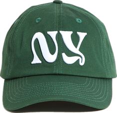 a green hat with the word ny on it and white letters that spell out ny