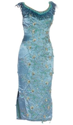 1950s Balmain-style turquoise silk evening gown embroidered with crystals and turquoise beads. No maker label. Available at 1stDibs. Luxury Embroidered Dress For Reception, Fitted Floral Embroidery Evening Dress For Reception, Fitted Floral Embroidered Evening Dress For Reception, Elegant Hand Embellished Embroidered Party Dress, Embroidered Fitted Evening Dress For Reception, Formal Embroidered Evening Dress With Fitted Bodice, Fitted Embroidered Evening Dress For Reception, Embroidered Silk Evening Gown, Elegant Embellished Embroidered Dress For Reception