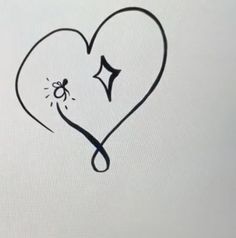 a drawing of a heart with a spider on it's side and the word i love you written in black ink