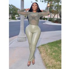 This “Olive You” Set Is Everything! The Bodysuit And Pants Both Are Made Of A Stretchy Lightweight Material. Super Cute And Perfect! Pair This Set With A High Heel, Tote Bag And You’re All Set Babe! This Comb Is Literally Everything And Perfect For This Fall Season. Olive Colored Mesh Bodysuit With Bottom Two Button Closure Leather Like Pants With An Elastic Waistband Some Stretch / True To Size Model Is Wearing A Large If You Have Any Questions, Feel Free To Reach Out To Us. We’d Be More Than H Fitted Green Bottoms For Date Night, Mesh Bodysuit, Olive Color, Fall Season, Perfect Pair, High Heel, Comb, Pant Jumpsuit, Leather Pants