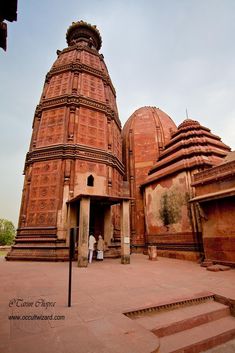 an old building with many domes and steps