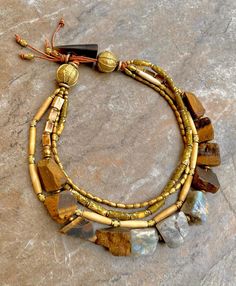 Bohemian Choker Chunky Labradorite, Tiger's Eye Stone and African Tribal Beads | eBay Large Stone Necklace, Rustic Adjustable Jewelry With Polished Beads, Adjustable Earthy Jewelry With Polished Beads, Rustic Beaded Gold Jewelry, Rustic Gold Beaded Jewelry, African Jewelry Necklaces, Bohemian Chic Jewelry, African Inspired Jewelry, Bohemian Jewels