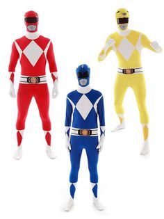 three different colored power rangers standing next to each other