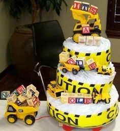 there is a cake made to look like a construction truck on top of the table