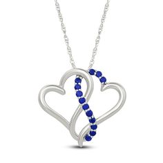 Two hearts collide in the prettiest way in this sweet and shimmering necklace. Sterling silver Two open hearts are entwined in the polished pendant Along the center, a curved ribbon of round blue lab-created sapphires shines 18-inch rope chain; spring ring clasp Sapphire Heart Necklaces For Anniversary, Sapphire Heart Necklace For Anniversary, Heart-shaped Sapphire Necklace For Anniversary, Elegant Sapphire Necklaces For Valentine's Day, Sapphire Heart Pendant Jewelry For Valentine's Day, Blue Open Heart Jewelry For Anniversary, Blue Heart Beads Jewelry For Anniversary, Blue Double Heart Jewelry For Anniversary, Blue Open Heart Necklace For Anniversary