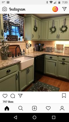 the kitchen is decorated for christmas with wreaths on the cabinets, and black and white checkered rug