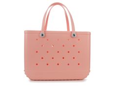 a pink handbag with polka dots on it