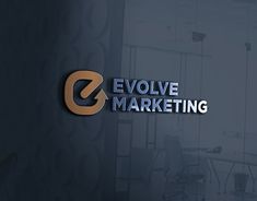 the logo for evolve marketing is displayed on a wall in an office building