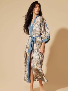 Wrap yourself in the luxurious feel of our ultra-soft, high-quality fabric, adorned with hand-painted floral prints. Designed to care for your skin morning and night, our robe kisses away wrinkles, ensuring joy for every occasion. Experience unmatched comfort and elegance, making each moment a celebration of beauty. • Silky Comfort: Made of high-quality polyester charmeuse, our robes are soft, lightweight and cooling for summer. They have a smooth and breathable texture that feels just like natu Luxury Colors, Gray Kimono, Chic Artwork, Aesthetic Expression, Asian Designers, Kimono Floral, Sweet Gift Ideas, Blue Kimono, Silk Kimono Robe