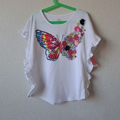 New With Tags. No Flaws. Size 8. Open To Offers! Multicolor Spring T-shirt For Playwear, Cute Spring Playwear Tops, Cute Spring Tops For Playwear, Playful Spring Tops For Playtime, White Butterfly Print Short Sleeve Top, White Casual Top With Butterfly Print, White Short Sleeve Top With Butterfly Print, Multicolor Spring T-shirt For Play, Spring Crew Neck Tops For Playtime