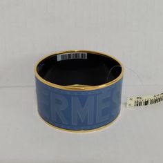 Condition: Nwt New Item With Tags; Never Worn. Excellent Condition Description: Herms Sellier Engraved Enamel Bangle Accentuated With Yellow Plated Gold Line: Bangle Material: Enamel Width: Extra Wide Metallic Finish: Yellow Gold Plated Color: 01 Bleu Turquin Size: 70 Herms Size: Circumference: Approximately 8.6" 21.9 Cm Inner Diameter: Approximately 2.6" Width: Approximately 1.5" Style Number: H151694f0170 Made In France All Items Are Authentic. Includes: Bangle Only; No Box Or Dustbag Note: Ha Luxury Blue Bracelets For Formal Occasions, Elegant Blue Bracelets For Evening, Elegant Blue Evening Bracelets, Formal Luxury Blue Bracelets, Designer Enamel Bangle Jewelry, Blue Enamel Bangle, Luxury Gold Enamel Bangle, Luxury Enamel Cuff Bangle, Hermes Enamel Bracelet