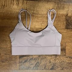 Super Cute Double Strapped Twist Back Sports Bra. Butter Soft Material. Lilac Colored. Comes With Removable Padding. Never Used. Athleisure Stretch Bra With Straps, Stretch Athleisure Bra, Athleisure Stretch Bra, Gym Bra With Adjustable Straps And Stretch, Medium Support Gym Bra, Sporty Workout Bra With Straps, Sporty Bra For Workout, Sporty Workout Bra, Strappy Gym Bra With Adjustable Straps