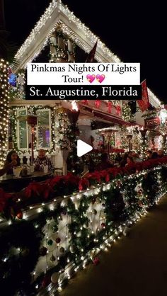 a house covered in christmas lights with the words pinkmas nights of lights