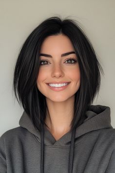 Click for More ➡️ | Save for Later ❤️  A sleek lob with very subtle layers around the ends gives an illusion of thicker hair. The deep black hue adds sophistication and intensity, making it a striking choice for those with naturally dark hair. (Sleek Black Lob with Subtle Layers - Hairstyles For Thin Hair) Short Dark Hair Middle Part, Long Dark Brown Bob, Short Haircuts For Black Hair, Short Straight Haircuts With Layers, Straight Lob Hair, Short Hair Straight Layers, Dark Brown Hair Shoulder Length Layered, Straight Black Hair Short, Best Haircuts For Thick Straight Hair