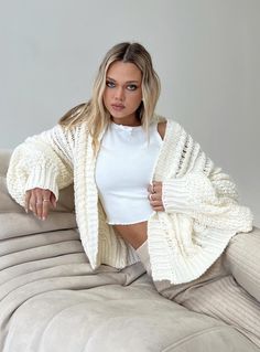 Cardigan  Oversized fit, cable knit, drop shoulder  Good stretch, unlined  100% polyester  Hand wash White Chunky Cardigan, Cozy Cream Knit Cardigan, Oversized Cable Knit Trendy Cardigan, Oversized Beige Knitted Cardigan, Oversized Solid Cable Knit Cardigan, Princess Polly Cardigan, Oversized Cream Cable Knit Top, Insta Model, Sweater Jackets