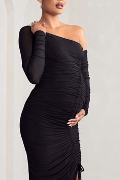 Our "Sweet Dreams" midi dress oozes style and sophistication. This elegant midi is perfect for all events throughout your pregnancy. whether it's for your baby shower or a glam night out the stretch-mesh fabric will flatter your bump whilst keeping you comfortable.Features- Mesh long sleeves- Asymmetrical neckline- Tie up cord detail- Thigh splitSizingModel is 5'9 and wears UK size 8 / US size 4Fit InformationMade from Jersey (95% Polyester 5% Elastane)Total length from top of shoulder: 120cmStr Flirty Ruched One Shoulder Evening Dress, Flirty One-shoulder Ruched Evening Dress, Maternity Dresses With Ruched Details, Off-shoulder Maternity Dress For Party, Stretch Ruched Asymmetrical Dress For Party, Stretch Ruched Asymmetrical Party Dress, Fitted One Shoulder Maternity Dress, Ruched One Shoulder Midi Dress For Night Out, Ruched One-shoulder Midi Dress For Night Out