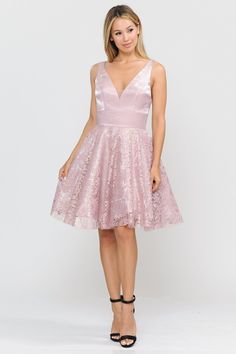 Look radiant in this V-neck cocktail dress with lace skirt by Poly USA 8418. This beautiful short sleeveless dress features a deep V-neckline secured with a sheer inset panel, side pockets, open strappy back, short A-line lace skirt, and a zipper closure. Affordably priced at $129, this short party dress is perfect for any formal event and will keep you on budget! Designer: Poly USA by Ed Young Style Number: 8418 Material: Satin, Lace, Polyester Details: Bra Cup, Fully Lined Fit: The model is 5' Cocktail A-line Evening Dress With Lace Bodice, V-neck Lace Bodice Dress For Prom, Evening V-neck Lace Dress With Lace Bodice, A-line Mini Dress With Lace Bodice, V-neck Lace Trim Dress For Prom, V-neck Scalloped Lace Dress For Prom, A-line Lace Dress With Lace Trim For Prom, A-line Evening Dress With Lace Bodice For Cocktail, V-neck Scalloped Lace Prom Dress