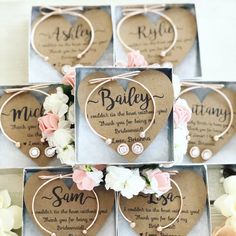 wedding favors in heart shaped boxes with names and flowers on the front, back and sides