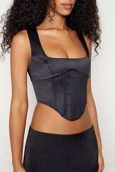 If you’re going to buy a bustier, choose one that does it all – this Signature style supports the bust with a deep scoop and trims the waist with structured boning and a pointed shape. A go-to wardrobe staple that can be styled with everything. Scoopneck Shoulder straps Lattice back closure Boned bodice 100% Polyester Model wears a size small Model measurements: Height 5’9”, Bust 32”, Waist 25.5”, Hips 35” One Piece Man, Boned Bodice, Knitwear Dress, Choose One, Bustier Top, Corset Top, Signature Style, Model Measurements, Lattice