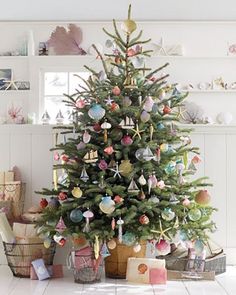 a decorated christmas tree in a living room