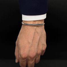 📿Welcome to Vamos Luxury. All handmade, carefully designed silver arm cuff is with you. 🌉Inspired by Istanbul, best quality material and the meticulous art of our designers! Unique designs met with dainty jewelry for men. 🎯Perfect for Everyday Wear, gifting, or a Special Occasion. Best man gift    The zirconium gemstone used around the silver cuff bracelet. ➡️Material; brass & bronze. 🏳️🌈Color options Gold - Silver 🎯for 5 to 7 inch wrists. 🎁Comes with a special gift box. 🚚Standard shippi Classic Formal Wristband Bracelet, Modern Adjustable Bangle For Anniversary, Minimalist Sterling Silver Bangle For Formal Occasions, Modern Cuff Wristband As Gift, White Cuff Bracelets For Formal Occasions, Elegant Formal Wristband Bracelet, Elegant Formal Bracelet Wristband, Modern White Gold Cuff Bracelet As Gift, Classic Adjustable White Gold Cuff Bracelet