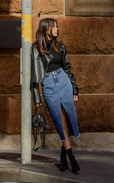 Get ready to elevate your denim game with the Janeve Midi Front Split Denim Skirt in Dark Blue. This pencil skirt is perfect for those who love the casual yet sophisticated look. Made from high-quality denim, this midi skirt features a front split that adds a touch of edge to your outfit. Its dark blue hue makes it perfect for Autumn styling, and its versatile design allows you to dress it up or down effortlessly.The high-waisted fit of this denim skirt accentuates your curves while providing co Trendy Denim Blue Skirt For Fall, Trendy High-waist Denim Pencil Skirt, Trendy Dark Wash Skirt For Fall, Casual Denim Skirt For Winter, Casual Denim Winter Skirt, Trendy Denim Skirt For Fall, Dark Wash Pencil Skirt For Spring, Trendy Denim Skirt For Winter, Medium Wash Denim Skirt For Fall