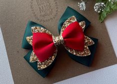 I love this bow !! Such a cute red , gold, and hunter green Christmas hair bow. The perfect Christmas hair bow to celebrate your little princess' Christmas or to visit Santa. My boutique hair bows are Light weight and attached to a no-slip alligator clips, perfect for girls of all ages.  Hair Bow Measures Approx. 4" x 3". Please reference the size before purchasing to ensure it is the size you would like.  Back to Pink hair bow boutiques store :  https://www.etsy.com/shop/PinkHairBowBoutique Hunter Green Christmas, Christmas Hairbow, Fancy Hair Bows, Christmas Hair Clips, Christmas Hair Clip, Woman Costumes, Princess Christmas, Holiday Hair Bows, Girls Hair Bows Diy