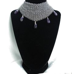 Stainless steel Mesh collar necklace with genuine Amethyst gemstones Black Metal Chainmail Necklace, Adjustable Black Chainmail Jewelry, Elegant Purple Metal Necklace, Elegant Black Chainmail Jewelry, Elegant Chainmail Metal Choker, Elegant Metal Chainmail Choker, Elegant Black Amethyst Necklace, Elegant Chainmail Necklaces For Party, Elegant Chainmail Necklace For Party