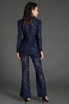 Elegance meets allure in our beaded sequin lace blazer set. This exquisite set features a blazer adorned with intricate beadwork and shimmering sequins, paired with matching tailored trousers. The delicate lace overlay adds a touch of elegance and femininity, making this ensemble truly captivating. Ideal for glamorous events, cocktail parties, or upscale dinners, this blazer set ensures you stand out with grace and style. Handmade customization Fabric composition: 90% polyester fiber, 10% spande Glamorous Long Sleeve Evening Suit, Luxury Long Sleeve Pantsuit For Party, Glamorous Sequined Suits For Night Out, Fitted Embellished Evening Pantsuit, Chic Embellished Party Suit, Fitted Sequined Suits For Parties, Formal Fitted Sequin Pantsuit, Elegant Formal Pantsuit For Party Season, Elegant Blue Sequined Sets