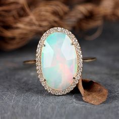 "\"Details: Item code :- ATR-2383 - 14K yellow solid gold (as shown) wt :1.26 gm - 0.17 ct diamonds - 1.96 ct opal - Ring size 17x12 mm & ring size 7 us Anjis touch jewelry supports ethical and eco-friendly practices and uses reclaimed and recycled metals whenever possible About my jewelry: All of the Anjis touch jewelry collection is handmade exclusively by me.  I hope that you will enjoy wearing my designs as much as I enjoy making them! Shipping: We have this in stock which we can ship in 2-3 Jewelry Friendship, Yellow Gold Cocktail Ring, Boulder Opal Ring, Ethiopian Opal Ring, Cocktail Jewelry, Fine Diamond Jewelry, Old Bridge, Gold Cocktail Ring, Handmade Fine Jewelry