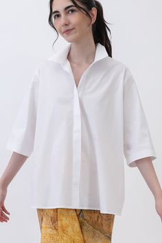 Unleash your playful side with our Camp Shirt in Italian Cotton Poplin Stretch! This shirt is not your average button-up; with its gathered back and button-up front, it's a charming twist on a classic. Plus, you can elevate your look with a chic high collar for added flair. Whether you're heading to casual spring or summer events or making it your go-to workday staple, this shirt promises versatility and style in every wear! size guide and fit New! In easy-fit sizing Designed for a comfortable, Italian Shirts, Gigi Shirts, Organza Shirt, Blouse Pants, Camp Shirt, Summer Events, Silk Organza, Casual Spring, Elevate Your Look