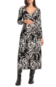 A ruched detail effortlessly showcases your growing bump in this long-sleeve maxi dress with a bold floral pattern all over. Slips on over head Surplice V-neck Long sleeves 95% viscose, 5% elastane Machine wash, line dry Imported Long Sleeve Maternity Maxi Dress For Fall, Maternity Maxi Dress With Long Sleeves For Fall, Maternity Long Sleeve Maxi Dress For Fall, Elegant Long Sleeve Maxi Dress For Maternity, Black Long Sleeve Dress With Floral Print, Fitted Long Sleeve Floral Maxi Dress, Maternity Long Sleeve Ruched Dress, Fall Maxi Dress With Ruched Long Sleeves, Black Floral Print Maxi Dress For Winter