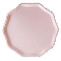 an empty pink plate on a white background