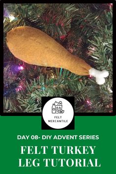 a christmas ornament hanging on a tree with the words felt turkey leg tutor