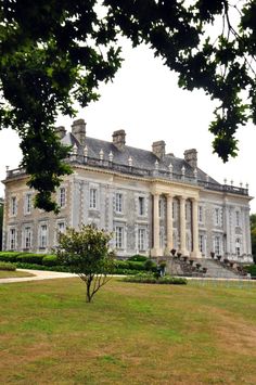 a large building with many windows on top of it