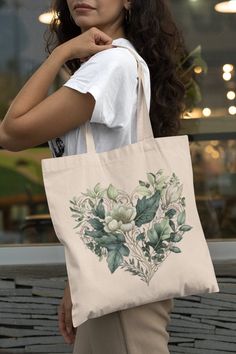 This 100% cotton bag comes in one size - 15" x 16"- perfect for everyday wear. While the canvas material will show off your designs in great colors, it's durable and will last for years. The bag features 20" handles (made from the same canvas), making it easy to carry even with a week's worth of shopping. .: 100% cotton canvas .: Heavy fabric (12 oz/yd² (406.9 g/m .: Sewn-in label .: Available in natural and black colors Flower-shaped Cotton Shoulder Bag For Everyday Use, Flower Shaped Cotton Shoulder Bag For Everyday Use, Everyday Cotton Flower-shaped Shoulder Bag, Cotton Flower-shaped Shoulder Bag For Everyday Use, Everyday Cotton Shoulder Bag With Floral Print, Bohemian Cotton Canvas Bag For Daily Use, Floral Print Cotton Shoulder Bag, Botanical Cotton Tote Bag, Botanical Canvas Bags For Everyday Use