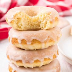 three glazed donuts stacked on top of each other