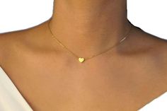 Adjustable Minimalist Heart Necklace, Minimalist Heart Necklace With Delicate Adjustable Chain, Dainty Adjustable Heart Necklace With Delicate Chain, Minimalist Adjustable Heart Charm Necklaces, Minimalist Adjustable Heart Pendant Charm Necklace, Minimalist Adjustable Charm Necklace With Heart Pendant, Adjustable Minimalist Heart Pendant Charm Necklace, Minimalist Charm Necklace Adjustable Length For Gift, Gold Heart-shaped Jewelry With Adjustable Length