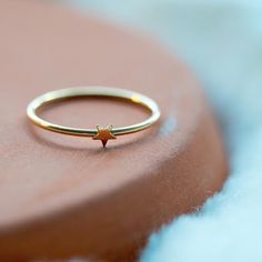 A 14k gold-filled simple stacking ring inspired by glittering stars! It feels classic yet playful. Perfect as a friendship ring/holiday gift and easy to be stackable and versatile. A fabulous everyday ring!DETAILS:☆ Crafted in 14K Gold-Filled. Nickel free.☆ High Quality Ring that lasts its color and beauty over time.☆ 1/25 in or 1mm wide each.☆ Comes beautiful packaged, in our branded Jewelry Box. Gift Ready.☆ 3 sizes available: US 6, 7, 8.☆ US size:  Inside diameter in ''· US 6:  (0.65'')· US 7 Gold Star-shaped Everyday Rings, Minimalist Star Shaped Rings For Everyday, Minimalist Star-shaped Rings For Everyday, Minimalist Star-shaped Midi Rings For Gifts, Minimalist Gold Star Shaped Rings, Minimalist Star-shaped Midi Rings As Gift, Minimalist Gold Star Rings, Simple Stacking Rings, Sun And Moon Rings