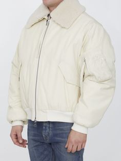 Bomber jacket in ivory nylon and cotton blend with detachable shearling collar. It features front two-way zip closure, two side snap-button flap pockets, a zip pocket on left sleeve and rib-knit trims on cuffs and hem. Regular fit. The model is 184cm tall and wears size L. Size nationality: US Product number: 1108456 Product code: UJK026PA0007185 Composition: 70% polyamide, 30% cotton Classic Cream Outerwear With Flap Pockets, Winter Cream Outerwear With Flap Pockets, Cream Outerwear With Ribbed Collar For Fall, White Outerwear With Ribbed Collar For Streetwear, White Streetwear Outerwear With Ribbed Collar, White Cotton Outerwear With Ribbed Collar, White Outerwear With Corduroy Collar And Long Sleeve, White Long Sleeve Outerwear With Corduroy Collar, Side Snap