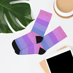 These soft pastel bisexual socks are a subtle way to display your bisexuality. They make a cute addition to your bi pride outfits and are cozy and comfy for lounging at home too. DETAILS• One size - very stretchy• Soft, comfy & cozy• Eco-friendly ♻ MADE FROM OVER 50% SUSTAINABLE MATERIAL58% recycled polyester, 22% nylon, 15% cotton and 5% elastaneThese socks are ONE SIZE and fit the following ranges US - 5 to 12 UK - 3 to 11.5EU - 35 to 46SOCK MEASUREMENTSLength: 12.41" / 31.5 cmWidth: 3.35" / 8 Casual Purple Socks For Gift, Casual Purple Socks As Gift, Trendy Purple Cotton Socks, Casual Purple Socks For Gifts, Comfortable Purple Cotton Socks, Bisexual Pride Flag, Bisexual Flag, Pride Outfit, Cute Pastel