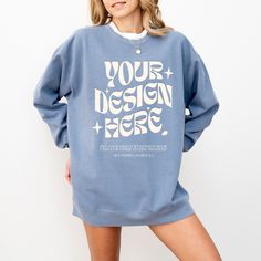 Oversized Blue Sweatshirt With Screen Print, Blue Cotton Sweater With Graphic Print, Blue Relaxed Fit Sweatshirt, Light Blue Relaxed Fit Crew Neck Sweater, Blue Drop Shoulder Cotton Sweatshirt, Blue Cotton Drop Shoulder Sweatshirt, Light Blue Crew Neck Sweatshirt With Letter Print, Oversized Blue T-shirt, Blue Relaxed Fit Cotton Sweater