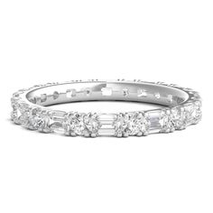 a white gold ring with baguetts and diamonds