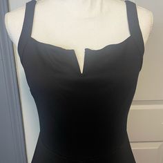 Sexy And Fitted Sleeveless Jumpsuit. Stretchy For Comfort. Pocket On Both Sides. Sleeveless Bodysuit With Built-in Bra For Night Out, Sleeveless Evening Bodysuit With Lined Body, Sleeveless Lined Jumpsuits And Rompers For Party, Fitted Sleeveless Bodysuit For Night Out, Black Lined Body Tank Top For Party, Chic Sleeveless Bodysuit For Date Night, Black Lined Party Tank Top, Stretch Lined Body Tank Top For Party, Party Stretch Tank Top With Lined Body