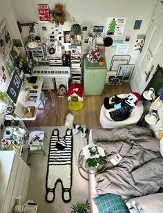 a room filled with lots of clutter and stuffed animals on top of the floor